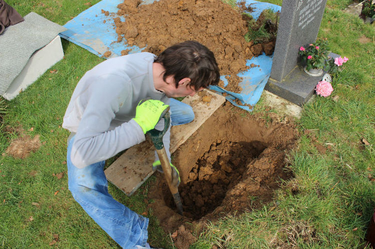 digging gravestone hole